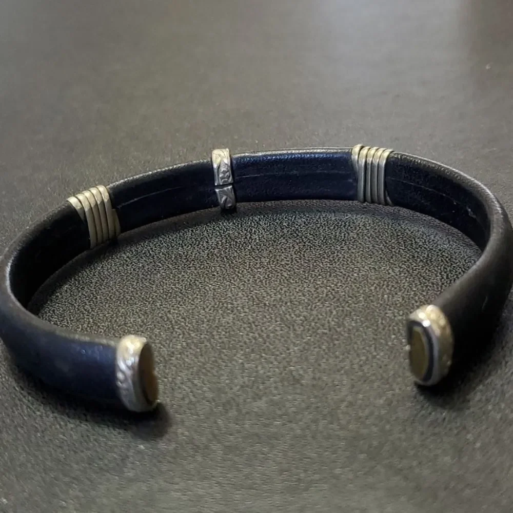 Black and silver tone cuff bracelet 6.75